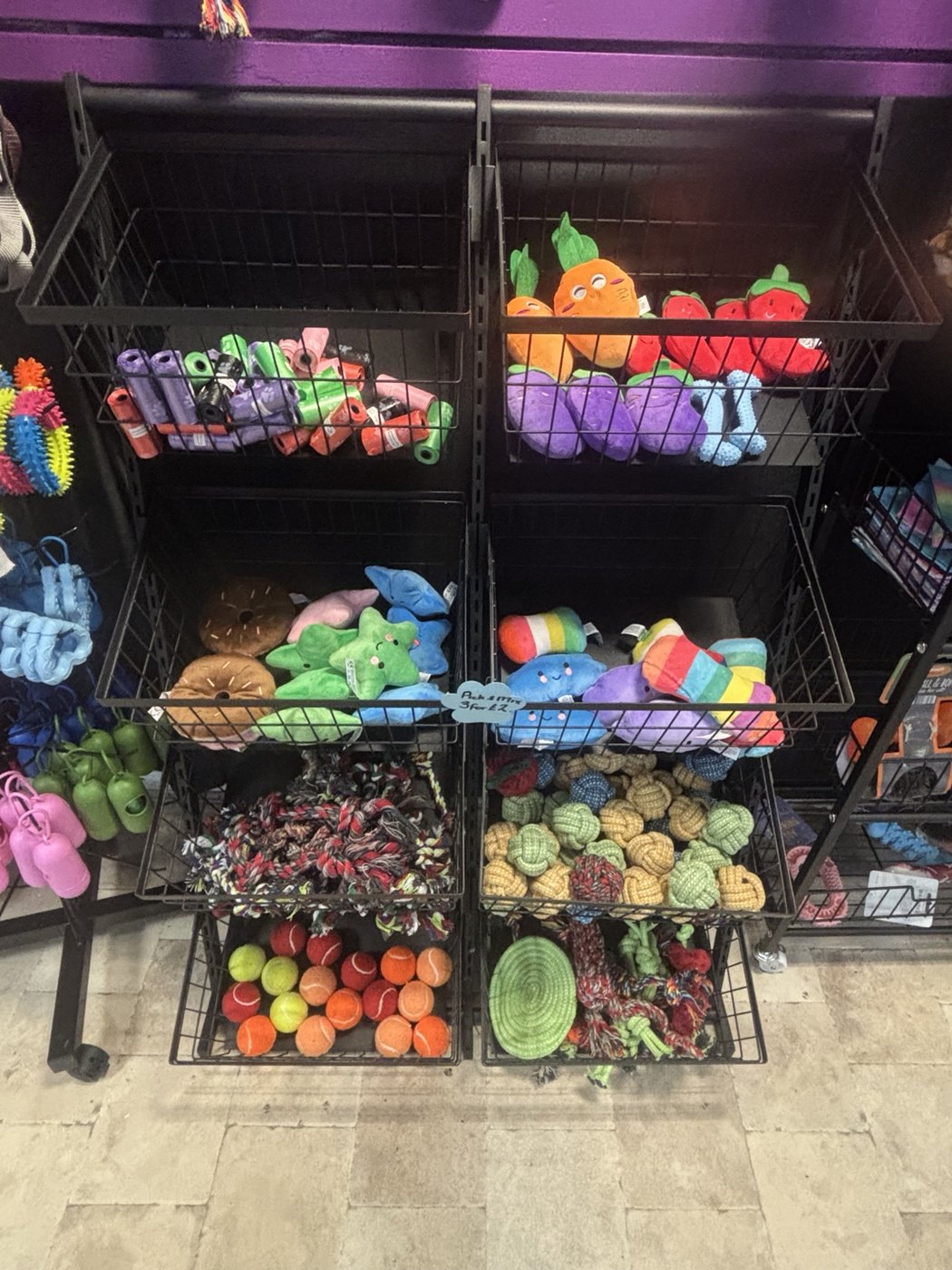 Bins of colourful dog toys at WLD Pet Shop